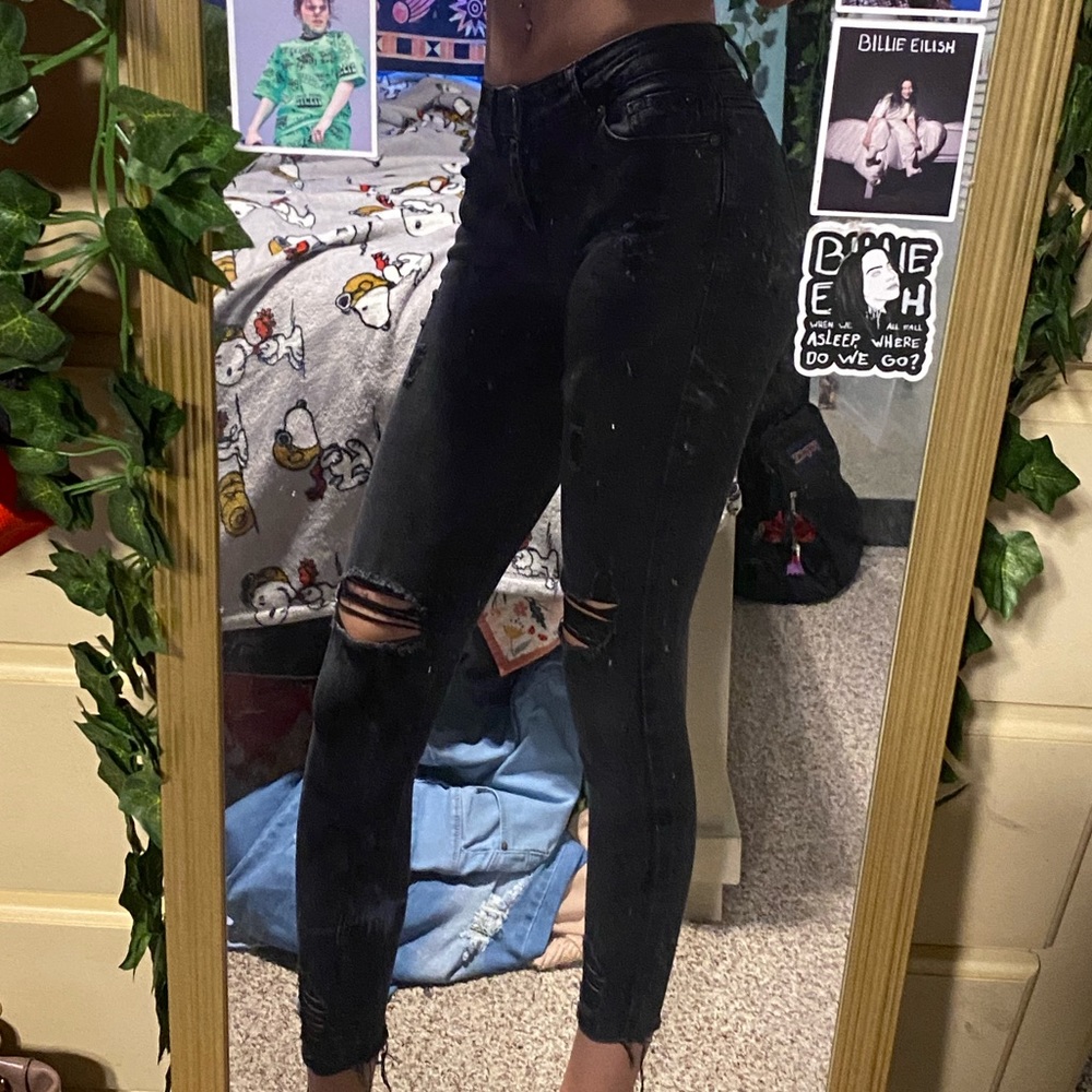 black ripped jeans